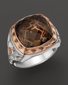 Sterling silver and 18K. pink gold, frame a faceted cushion cut smoky quartz. By Tacori.