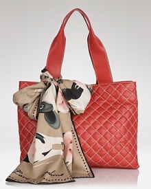 Swap the staid tote bag in favor of this quilted leather style from Love Moschino. Accessorized with a bold scarf, this bag lives to enliven your daytime uniform. Swap the staid tote bag in favor of this quilted leather style from Love Moschino. Accessorized with a bold scarf, this bag lives to enliven your daytime uniform.