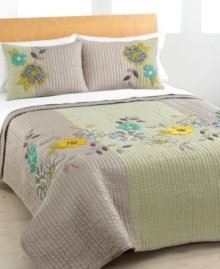 Petal perfect. Floral appliqués and intricate embroidery embellish soft quilting for a look that's at once carefree and decidedly feminine. The Bohemia quilt features both a lustrous solid and a printed circle pattern. Reverses to solid. (Clearance) Petal perfect. Floral appliqués and intricate embroidery embellish soft quilting for a look that's at once carefree and decidedly feminine. The Bohemia quilt features both a lustrous solid and a printed circle pattern. Reverses to solid. (Clearance)