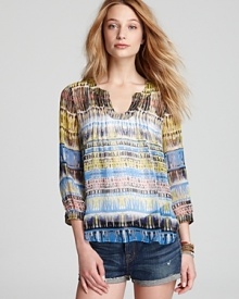 A vibrant tribal print shirt from Plenty by Tracy Reese shows off your boho-chic side-summer sensational with jean shorts or belted over a flowing maxi skirt.