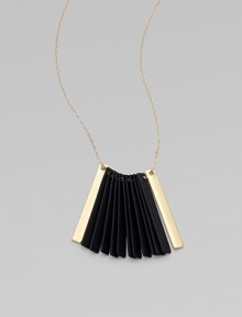 Black-finished strips hang together in a tapered fan shape, creating drama in this stunning pendant on a delicate chain.Black finishingGoldtone, brass and goldplatingLength, about 27½Slip-on stylingMade in USA Black-finished strips hang together in a tapered fan shape, creating drama in this stunning pendant on a delicate chain.Black finishingGoldtone, brass and goldplatingLength, about 27½Slip-on stylingMade in USA
