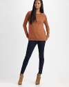 Sassy wool crewneck with semi-sheer, open-stitch sleeves and a split hem. Ribbed crewneckLong open-knit sleevesRibbed cuffsRibbed split hemWoolDry cleanImported