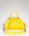 Inspire bag envy with this richly quilted Marc Jacobs satchel, Featuring a brilliant chain link strap. Don it with any ensemble and hit the town with attitude.