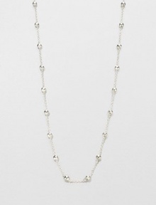 A simply chic design featuring hammered sterling silver beads on a long link chain. Sterling silverLength, about 37Slip-on styleImported 
