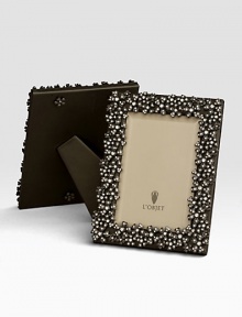 Swarovski crystals lend a twinkling effect to this oxidized platinum tone design. Holds 5 X 7 photoClassic beveled glassStretched leather backingGift boxedImported Swarovski crystals lend a twinkling effect to this oxidized platinum tone design. Holds 5 X 7 photoClassic beveled glassStretched leather backingGift boxedImported