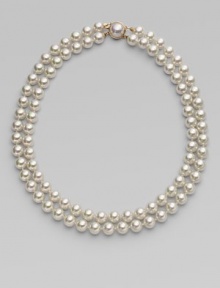 Double the elegance on two rows of white organic round pearls and clasped with an exquisite mabe pearl. 10mm white round pearls 18k gold vermeil Length, about 18 Mabe pearl clasp Made in Spain Double the elegance on two rows of white organic round pearls and clasped with an exquisite mabe pearl. 10mm white round pearls 18k gold vermeil Length, about 18 Mabe pearl clasp Made in Spain