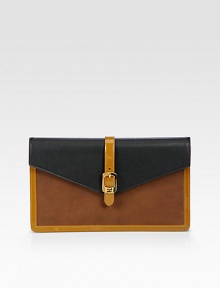 Sumptuous Italian leather in rich colors is combined with shiny patent leather accents for a tailored flap-top design. Magnetic snap flap closureOne outside zip pocketOne inner zip compartmentOne inside open pocketEight credit card slotsSuede, leather and cotton lining9¾W X 6H X 1DMade in Italy Sumptuous Italian leather in rich colors is combined with shiny patent leather accents for a tailored flap-top design. Magnetic snap flap closureOne outside zip pocketOne inner zip compartmentOne inside open pocketEight credit card slotsSuede, leather and cotton lining9¾W X 6H X 1DMade in Italy