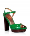 Vibrant grass green patent leather platform sandals from Marc by Marc Jacobs - Retro-cool with a modern twist, these chic shoes add a stylish accent to any outfit - Peep-toe with a front platform and stacked wood heel - Patent leather cut out front - Pair with high-waisted flared jeans, a boho blouse, and a floppy felt hat