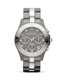 MARC BY MARC JACOBS makes a metallic statement with this dual tone watch. Crated of stainless steel with gunmetal and silver glitz accents, it's a super striking choice. MARC BY MARC JACOBS makes a metallic statement with this dual tone watch. Crated of stainless steel with gunmetal and silver glitz accents, it's a super striking choice.