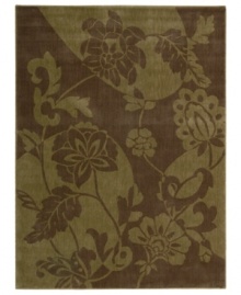 Fresh and contemporary, this attractive rug puts the spotlight on fashionable decor. A cool, casual design of flowers is inverted by stretched circles in two room-changing shades of brown. Woven from a blend of synthetic fibers for exceptional durability and color clarity. Fresh and contemporary, this attractive rug puts the spotlight on fashionable decor. A cool, casual design of flowers is inverted by stretched circles in two room-changing shades of brown. Woven from a blend of synthetic fibers for exceptional durability and color clarity.