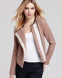 Sophistication with an edge is DIANE von FURSTENBERG's signature and this beautifully tailored wool-blend jacket taps into that aesthetic with effortless chic.