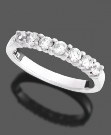 Add a little extra sparkle to your special occasion. This beautifully crafted anniversary band features seven, round-cut diamonds (3/4 ct t.w.) in a polished 14k white gold setting. Add a little extra sparkle to your special occasion. This beautifully crafted anniversary band features seven, round-cut diamonds (3/4 ct t.w.) in a polished 14k white gold setting.