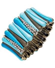 Infuse your spring and summer look with a little extra color! INC International Concepts' versatile slip-on style feature an oxidized brass-plated mixed metal setting with an intricate turquoise enamel design and sparkling glass accents. Bracelet stretches to fit wrist. Approximate diameter: 2-1/4 inches.