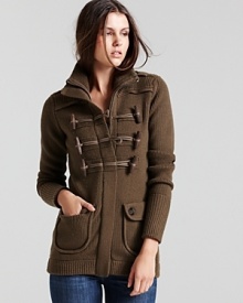 Military khaki lends utilitarian chic, while front toggles offer classic appeal. From Burberry Brit.