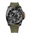 Ultra-masculine and ready to hit the ground running. Sport watch by Tommy Hilfiger crafted from olive green silicone strap and round black ion-plated stainless steel case. White numerals and orange flag logo at bezel. Black dial features stick indices, numerals at twelve, three, six and nine o'clock, date window at four o'clock, luminous hour and minute hands, orange-tipped second hand and text logo. Quartz movement. Water resistant to 50 meters. Ten-year limited warranty.