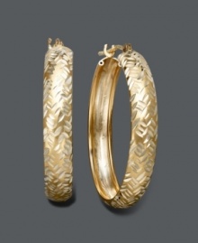 Eternal style in statement-making hoops. Earrings feature an intricate diamond-cut pattern crafted in 14k gold and sterling silver. Approximate diameter: 1 inch. Eternal style in statement-making hoops. Earrings feature an intricate diamond-cut pattern crafted in 14k gold and sterling silver. Approximate diameter: 1 inch.