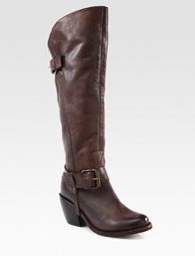 Western-inspired tall silhouette of burnished leather with buckle straps and a chunky stacked heel. Stacked heel, 3 (75mm)Shaft, 17Leg circumference, 14½Leather upperPull-on style with adjustable buckle strapsLeather lining and solePadded insoleImported