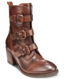 A trio of buckles adds bold detail to the rustic style of Vince Camuto's Dassia booties.