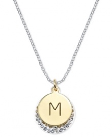 Letter perfection. This sterling silver necklace holds a pendant set in 14k gold and sterling silver plated topped with an M and adorned with crystal for a stunning statement. Approximate length: 18 inches. Approximate drop: 7/8 inch. Approximate drop width: 5/8 inch.