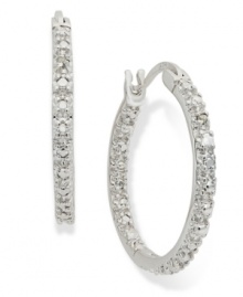 A girl can never have too much sparkle. Victoria Townsend's stunning hoop earrings are set in sterling silver with round-cut diamond accents that truly dazzle. Approximate diameter: 1 inch. A girl can never have too much sparkle. Victoria Townsend's stunning hoop earrings are set in sterling silver with round-cut diamond accents that truly dazzle. Approximate diameter: 1 inch.