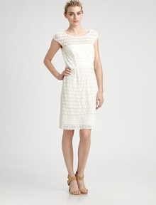 Lacy cotton macrame, in a chic, ultra-feminine silhouette.Jewel necklineCap sleevesTwo front pleatsConcealed side zipAbout 21½ from natural waistCottonDry cleanImportedModel shown is 5'11 (180cm) wearing US size 4. Lacy cotton macrame, in a chic, ultra-feminine silhouette.Jewel necklineCap sleevesTwo front pleatsConcealed side zipAbout 21½ from natural waistCottonDry cleanImportedModel shown is 5'11 (180cm) wearing US size 4.