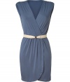 Impossibly feminine and incredibly flattering, Akikos wrap dress transitions beautifully from chic days to sultry cocktails - Wrapped V-neckline, sleeveless, gathered shoulders, tailored at the waist with a belt - Form-fitting - Pair with pumps and a statement handbag