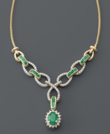 Make like a queen in this royalty-inspired masterpiece. Beautiful oval and round-cut emeralds (1-1/2 ct. t.w.) glisten next to round-cut diamond swirls (1/5 ct. t.w.). Crafted in 14k gold. Approximate length: 18 inches. Approximate drop: 2-1/2 inches. Make like a queen in this royalty-inspired masterpiece. Beautiful oval and round-cut emeralds (1-1/2 ct. t.w.) glisten next to round-cut diamond swirls (1/5 ct. t.w.). Crafted in 14k gold. Approximate length: 18 inches. Approximate drop: 2-1/2 inches.