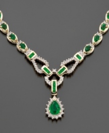 This exquisite royalty-inspired design presents emeralds (8-1/3 ct. t.w.) fully surrounded by diamonds (1-1/5 ct. t.w) in a dramatic 14k gold toggle-style drop necklace. Approximate length: 17 inches. This exquisite royalty-inspired design presents emeralds (8-1/3 ct. t.w.) fully surrounded by diamonds (1-1/5 ct. t.w) in a dramatic 14k gold toggle-style drop necklace. Approximate length: 17 inches.