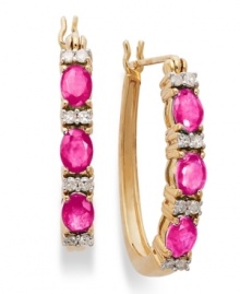 A color infusion. These 14k gold hoop earrings get a sparkling update with oval-cut rubies (1-1/5 ct. t.w.) and sparkling round-cut diamonds (1/8 ct. t.w.). Approximate diameter: 3/5 inch. A color infusion. These 14k gold hoop earrings get a sparkling update with oval-cut rubies (1-1/5 ct. t.w.) and sparkling round-cut diamonds (1/8 ct. t.w.). Approximate diameter: 3/5 inch.