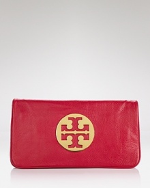Get spotted on the street carrying this leather clutch from Tory Burch. Detailed with the brand's logo, it's an effortless way to ease into evening. Get spotted on the street carrying this leather clutch from Tory Burch. Detailed with the brand's logo, it's an effortless way to ease into evening.