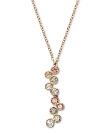 Alluringly asymmetrical. A distinctively designed silhouette makes a striking statement on Swarovski's Fidelity Silk pendant necklace. Multicolored pastel crystals in a beautiful bezel setting complement the gold tone mixed metal setting. Approximate length: 16 inches. Approximate drop: 1-1/2 inches. Alluringly asymmetrical. A distinctively designed silhouette makes a striking statement on Swarovski's Fidelity Silk pendant necklace. Multicolored pastel crystals in a beautiful bezel setting complement the gold tone mixed metal setting. Approximate length: 16 inches. Approximate drop: 1-1/2 inches.