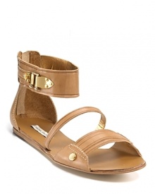 Luxe gold-tone hardware adds gilded gleam to the Barret sandals by Cynthia Vincent.