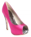 Textured heels and peek-a-boo platforms are a welcome detail on GUESS by Marciano's Kawa platform evening pumps. Making an already awesome satin shoe...that much cuter! (Clearance)