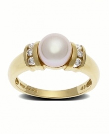 Sheer glamour in white on white. This ring design presents an 8mm cultured pearl offset by the brilliance of diamond. accents. Set in 14k gold. Sheer glamour in white on white. This ring design presents an 8mm cultured pearl offset by the brilliance of diamond. accents. Set in 14k gold.