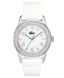 Athletic glamour is not a contradiction. Advantage watch by Lacoste crafted of white rubber logo-stamped strap and round stainless steel case. Bezel embellished with crystal accents. White mother-of-pearl dial features silver tone numerals and dot markers, minute track, three hands and iconic crocodile logo. Quartz movement. Water resistant to 50 meters. Two-year limited warranty. Athletic glamour is not a contradiction. Advantage watch by Lacoste crafted of white rubber logo-stamped strap and round stainless steel case. Bezel embellished with crystal accents. White mother-of-pearl dial features silver tone numerals and dot markers, minute track, three hands and iconic crocodile logo. Quartz movement. Water resistant to 50 meters. Two-year limited warranty.