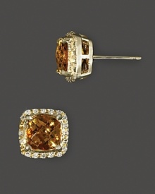 Diamonds frame faceted citrine, set in 14K yellow gold. Diamonds frame faceted citrine, set in 14K yellow gold.