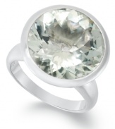 Cocktail ring - a must! Every girl needs a sparkler in her collection, and this round-cut green quartz (8-3/4 ct. t.w.) ring is just the ticket. Set in sterling silver. Size 7.