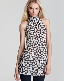 With a high neck, Sweet Pea's spot printed blouse makes waves in bold black and white. With a high neck, Sweet Pea's spot printed blouse makes waves in bold black and white.