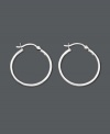 A classic piece that every woman should own. Simple smooth hoop earrings set in sterling silver. Approximate diameter: 1 inch.