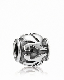 A mix of polished and oxidized silver creates depth and dimension on this elegant PANDORA charm.