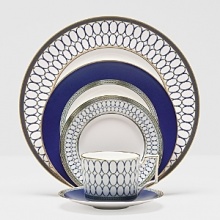 Embellished with intricate garlands, oval links and a fanciful dragon motif, this Wedgwood dinnerware evokes Europe's glorious Renaissance period. Rendered in deep blue and gold to transform any formal meal into a spectacular royal gala. Embellished with intricate garlands, oval links and a fanciful dragon motif, this Wedgwood dinnerware evokes Europe's glorious Renaissance period. Rendered in deep blue and gold to transform any formal meal into a spectacular royal gala.