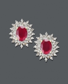 Searching for a new flame? These dynamic stud earrings will spice up your look in seconds! Oval-cut rubies (3-3/8 ct. t.w.) stand out against concentric circles of round-cut diamonds. (3/4 ct. t.w.) Crafted in 14k gold. Approximate diameter: 3/4 inch. Searching for a new flame? These dynamic stud earrings will spice up your look in seconds! Oval-cut rubies (3-3/8 ct. t.w.) stand out against concentric circles of round-cut diamonds. (3/4 ct. t.w.) Crafted in 14k gold. Approximate diameter: 3/4 inch.