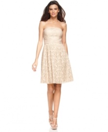 A classic look that's also completely on-trend: Vince Camuto's strapless dress mingles lace with pleated details for a beautiful feminine effect.