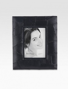 A patchwork of genuine snakeskin makes this frame especially distinctive for displaying treasured photos.Soft, padded designShadowbox effectSnakeskinElegantly packaged for gift-givingImportedDIMENSION INFORMATION4 X 6 5 X 7 