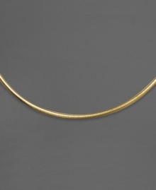 Stunning style with the simplest design. This beautiful Omega necklace reverses for versatility. Crafted in 14k gold over sterling silver and sterling silver. Approximate length: 17 inches. Stunning style with the simplest design. This beautiful Omega necklace reverses for versatility. Crafted in 14k gold over sterling silver and sterling silver. Approximate length: 17 inches.