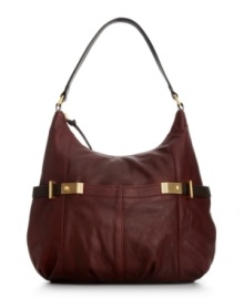 Elevate your everyday style status with this laid-back silhouette from Calvin Klein that marries fab with fashion. Outfitted with shiny golden hardware, bar and stud accents and plenty of pockets, it pairs perfectly with your workday or weekend wardrobe. Elevate your everyday style status with this laid-back silhouette from Calvin Klein that marries fab with fashion. Outfitted with shiny golden hardware, bar and stud accents and plenty of pockets, it pairs perfectly with your workday or weekend wardrobe.