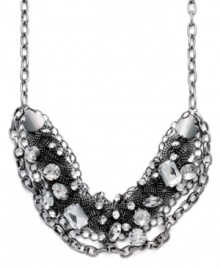 Prepare to turn heads in this statement-making style. Bar III's trend-setting necklace combines woven mesh chains and sparkling crystals in a chic, clustered pattern. Crafted in silver tone mixed metal. Approximate length: 10 inches + 3-1/2 inch extender. Approximate drop: 5 inches.