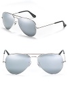 Get set for summer with the flash of Ray-Ban's aviator sunglasses. Adjustable nose pads to help secure fit.