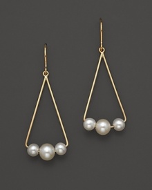 Gleaming freshwater pearls add luster to 14K. yellow gold. Gleaming freshwater pearls add luster to 14K. yellow gold.