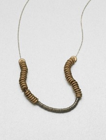 This technical, yet delicate design features clusters of sequins and nuts on a dainty link chain. Oxide-plated sequinsBrass nutsGold-filled chainLength, about 18Gold-filled S-hook closureMade in USA This technical, yet delicate design features clusters of sequins and nuts on a dainty link chain. Oxide-plated sequinsBrass nutsGold-filled chainLength, about 18Gold-filled S-hook closureMade in USA